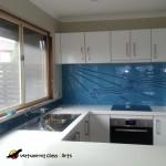 Stunning wathaurong blue splashback in a white kitchen