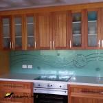 Wathaurong green splashback with a butterfly