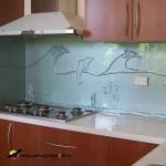 Silver sea theme splashback with waves, dolphins and fish